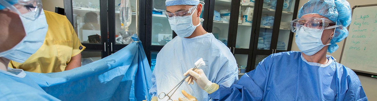 Doctor performing surgery in Operating Room